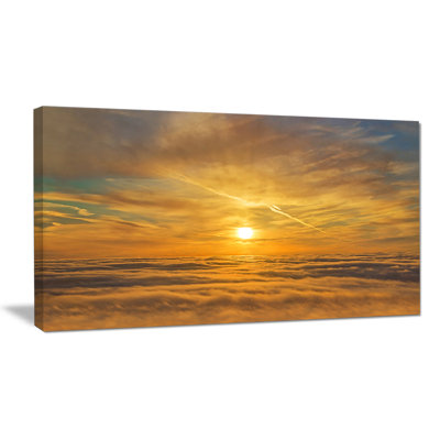 Coucher de soleil doré sur des nuages - reproduction de photo sur toile tendue
