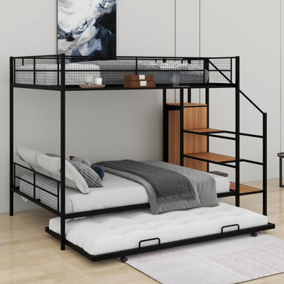 Lit superposé simple au-dessus d'un lit double en métal avec lit gigogne, échelle de rangement et garde-robe