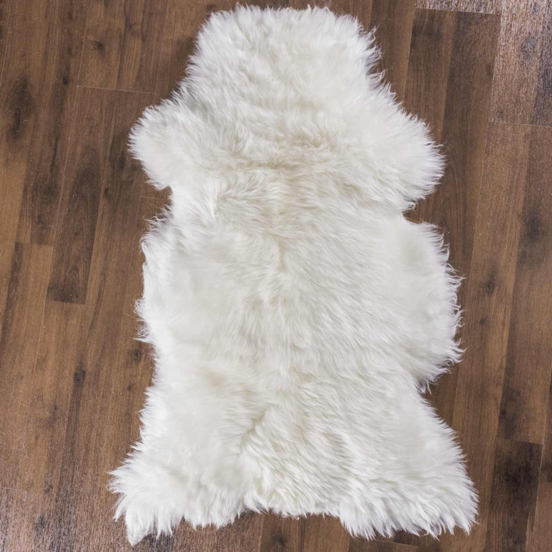 Tapis zone ivoire naturelle en peau mouton