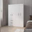 Armoire blanche à 4 portes avec tiroirs et tablette