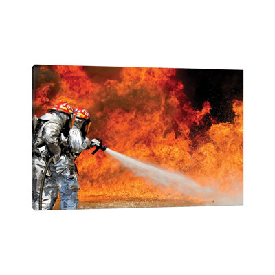 Firefighters Combat A Jp-8 Jet Fuel Fire - Wrapped Canvas Print