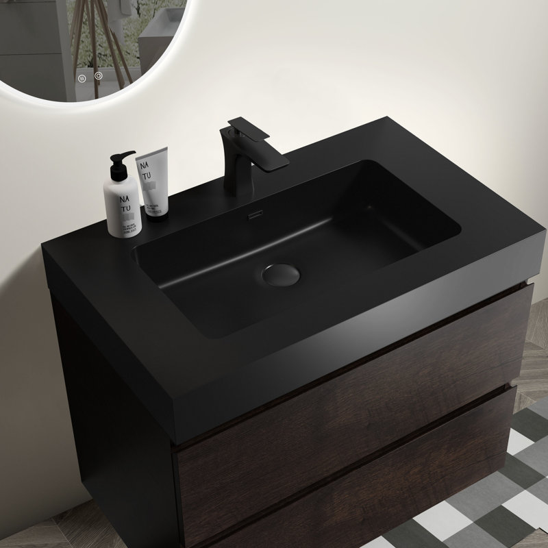 Lavabo intégré noir mat avec conception en quartz et trop-plein pour salle de bain