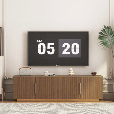 Jusqu'à 65 po, meuble télé pour le salon avec 4 portes cannelées, centre de divertissement avec 16 couleurs DEL, console télé avec rangement