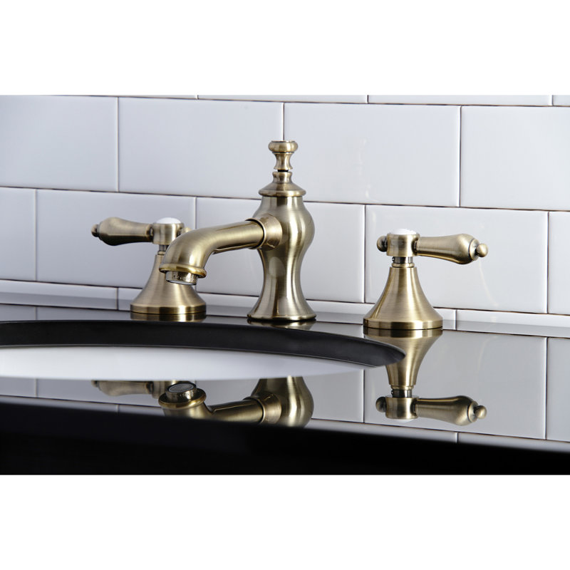 Kingston Brass Heirloom Two-Handle 3-Hole Deck Mount Widespread Bathroom Faucet with Brass Pop-Up Drain, Vintage Brass