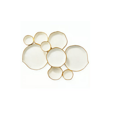 A Pallet Gold-colored Modular Bowl Set With Connecting Compartments As A Centerpiece For Party/gathering Table Decorations
