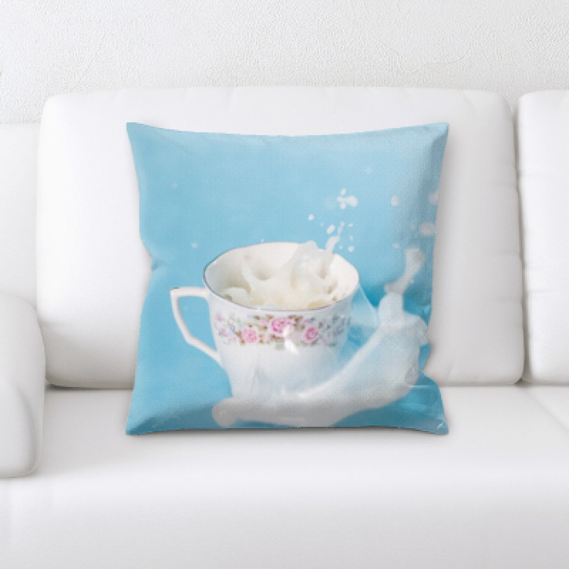 Coussin décoratif lait renversé