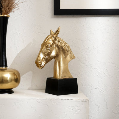 Gracieuse sculpture de cheval en aluminium poli doré sur base noire - | Figurine de table