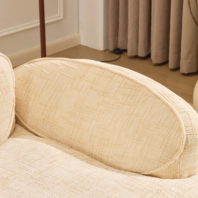 canapé courbé pour deux personnes. Il a des accoudoirs des deux côtés, est livré avec deux coussins, convient aux petits appartements et peut être placé dans le salon ou la chambre à coucher.
