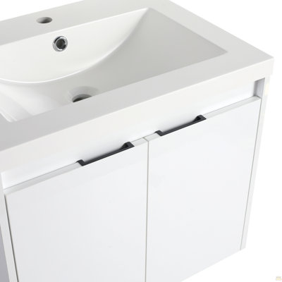 Meuble-lavabo 24 po avec lavabo en résine, 2 portes à fermeture en douceur, fixation à flotteur