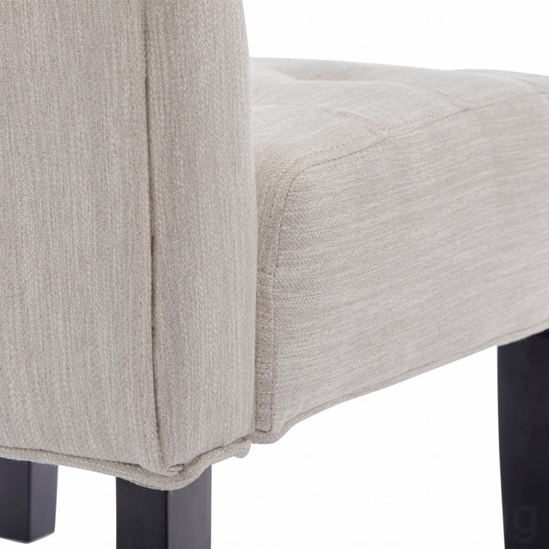 Ensemble de 2 fauteuils de chambre beige capitonnés