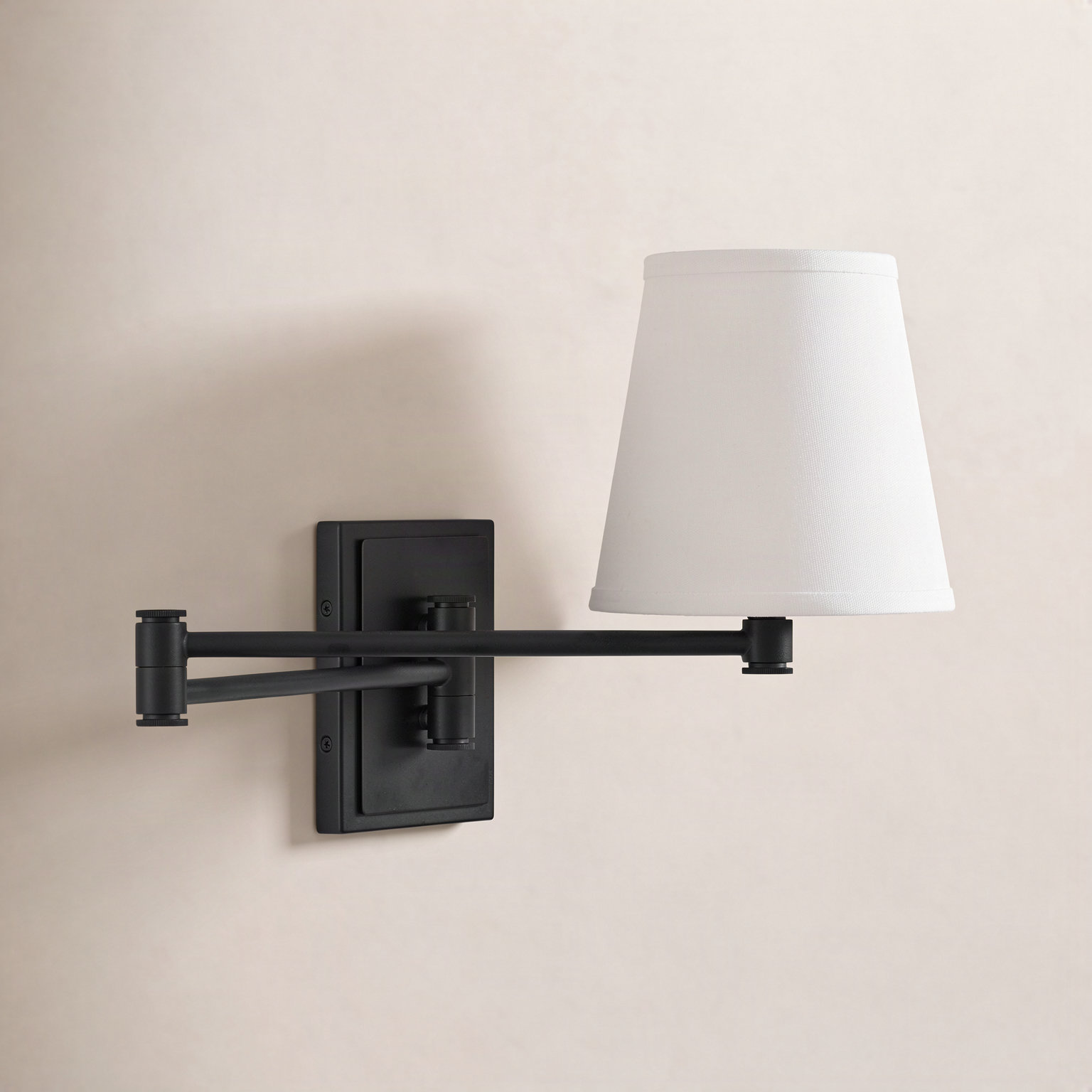 Janis Single Light Steel Dimmable Plug-in Swing Arm Sconce, Black