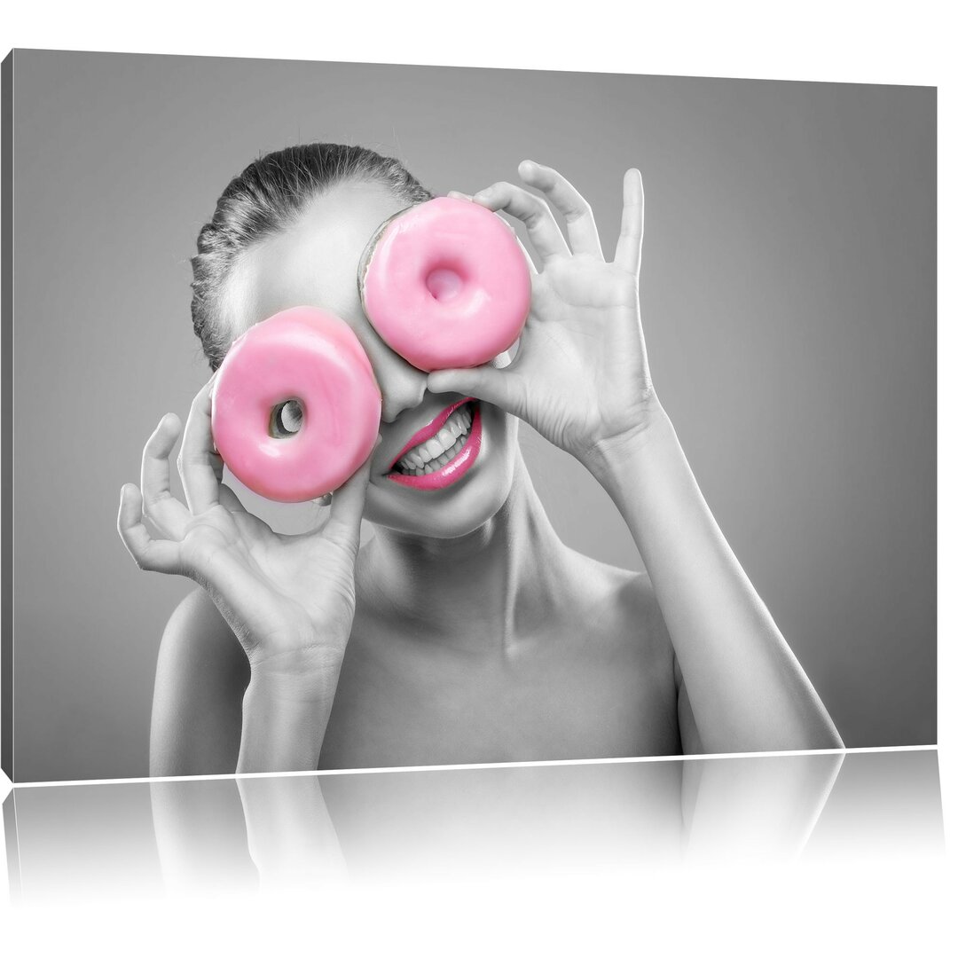 Leinwandbild Frau mit Donut Augen