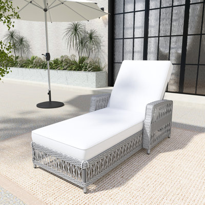 Chaise longue d'extérieur avec coussins