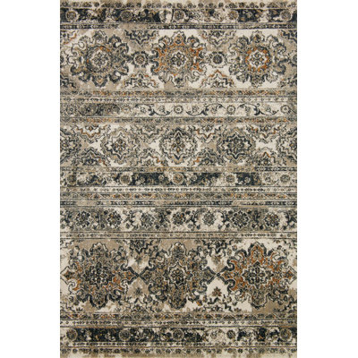 Tapis décoratif taupe florale Wainwright