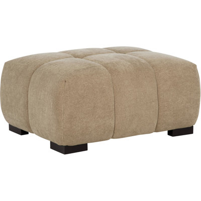 Chameau contemporain - couleur avec capitonnage vertical, mousse superposée et pieds blocs noirs pour un support stable en tissu de style cascade, un coussin décoratif invitant