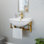 Lavabo de salle de bain blanc en forme de U avec robinet et trop-plein