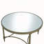 Table basse Guido au fini expresso avec plateau miroir et structure en laiton antique, idéale pour les salons élégants