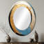 Miroir mural ovale sur métal doré-465829071
