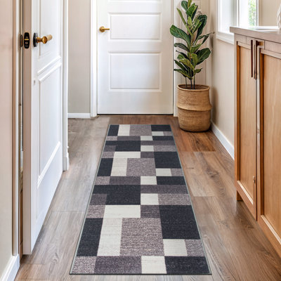 Tapis gris, noir et blanc touffeté à motif géométrique Akieba