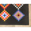 Tapis rectangulaire noir / orange / bleu en polypropylène tissé à la machine Edlin-1701135480