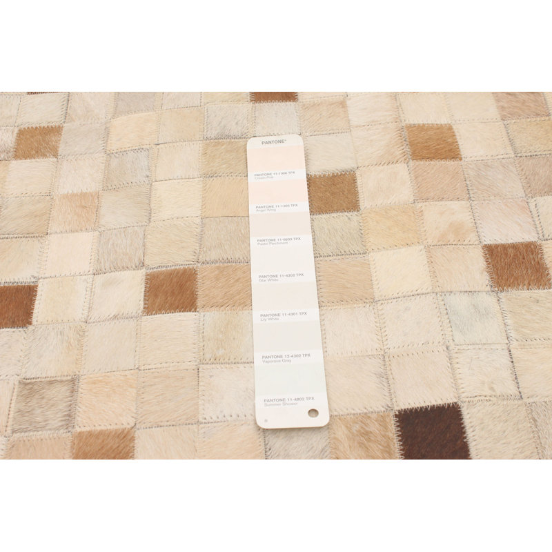 Tapis beige en peau de vache Hawarth