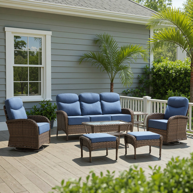 Alakai 7 Piece Outdoor Wicker Garden Party Conversation Set With Swivel Chairs, Sofa, Ottomans And Tables, Blue