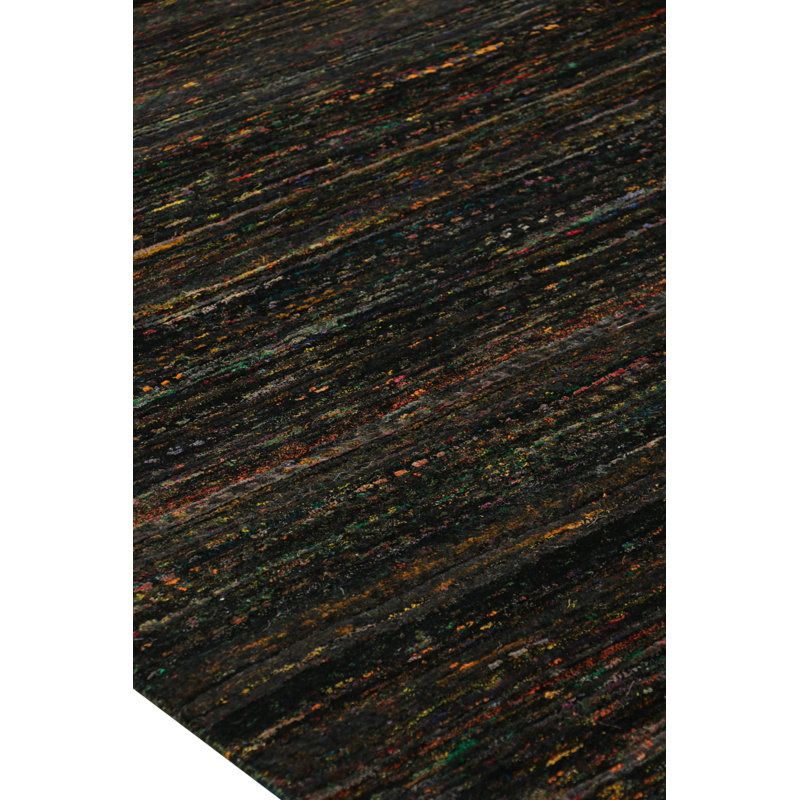 Rug & Kilim’S Oversized Textural Rug In Black With Bold Polychromatic Striae