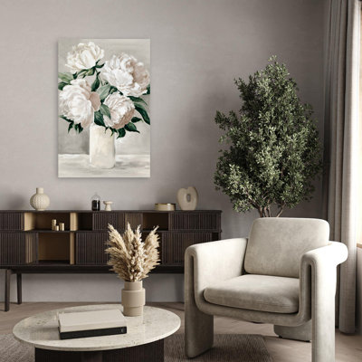 Fleurs et pivoines dans un vase blanc