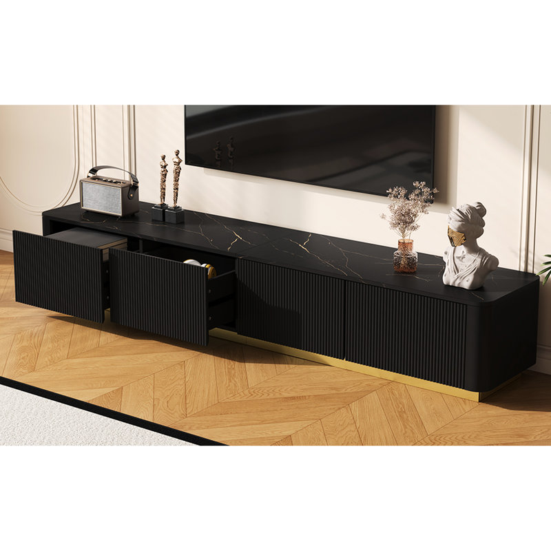 Meuble télé de luxe de 85 po, console média cannelée, plateau en faux marbre noir, 4 tiroirs, base dorée, conception incurvée, plateau de table