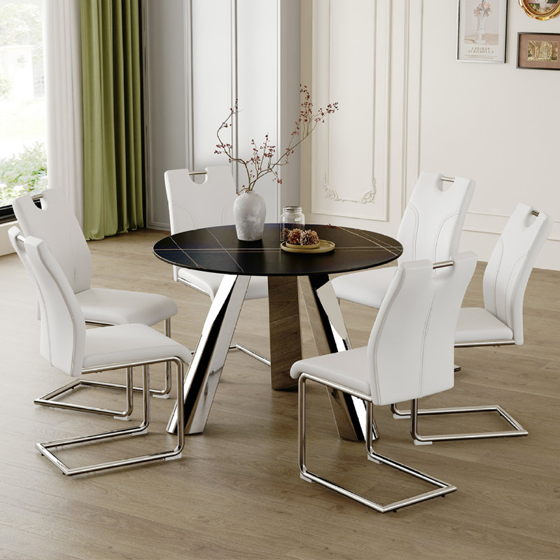 42-Inch Black Sintered Stone Round Table with Stainless Steel Legs and White PU Leather Dining Chairs