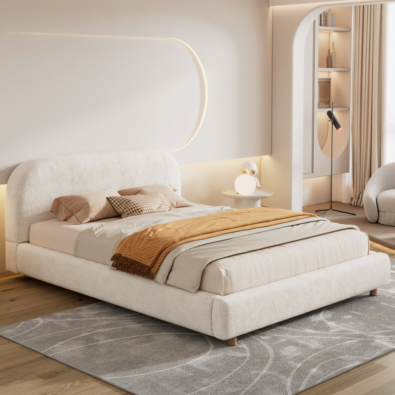 Lit sur plateforme rembourrÃ© avec tÃªte de lit incurvÃ©e et tissu Keo Loop, Grand lit