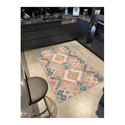 Tapis lavable en machine rose