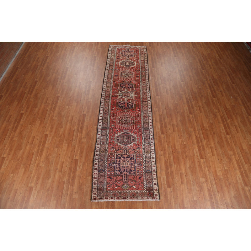 Tapis rouge à motif géométrique 4 x 14