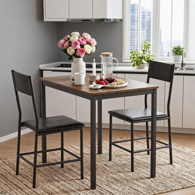 Ensemble de table de salle à manger 3 pièces industriel, table rectangulaire rustique en grain de bois rétro avec 2 chaises rembourrées en polyuréthane noir, mobilier de coin-repas en métal compact pour petit appartement