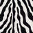 Alminus Zebra Glam Animal Print Area Rug-829941544