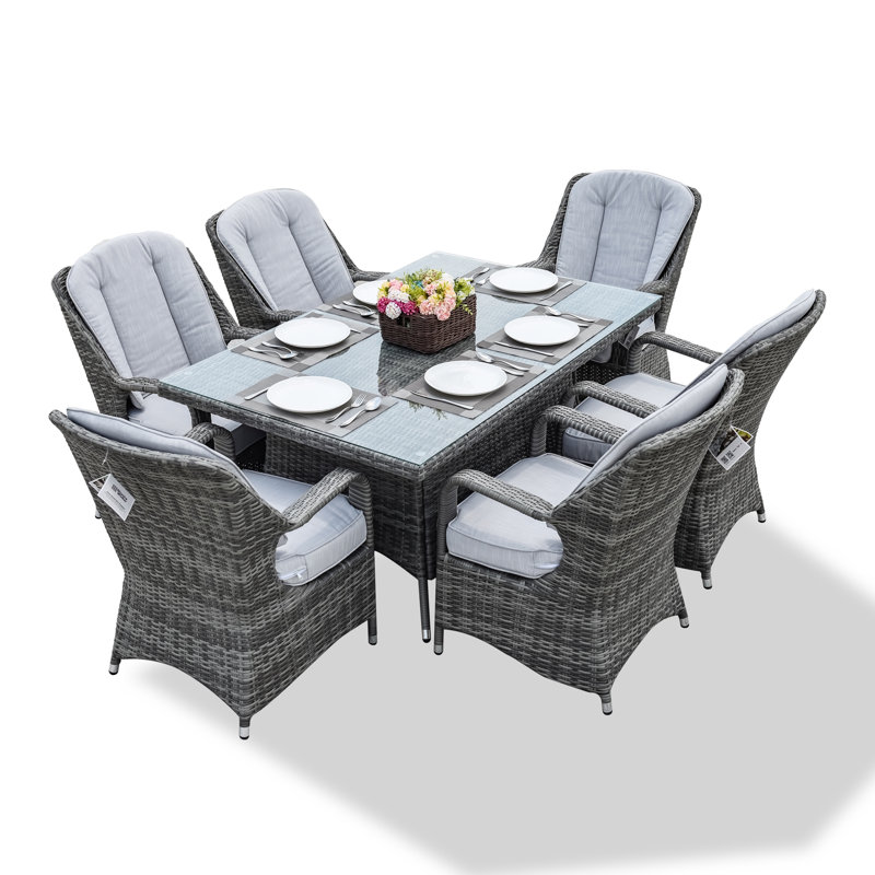 Algird 6 - Person Wicker Patio Dining Set with Rectangular Table , Cushions Included, Grey