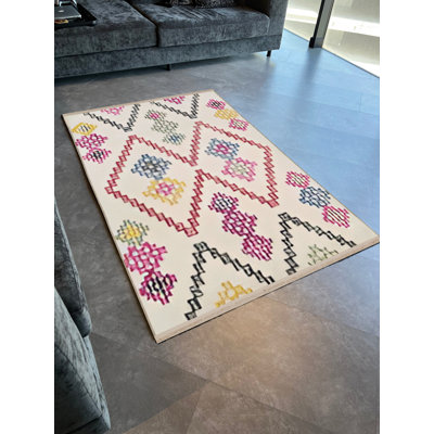Tapis décoratif moderne à motif géométrique rose et beige