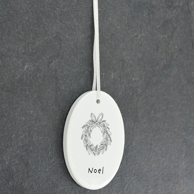 Noel Wreath Oval Shaped Ceramic Ornament