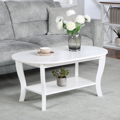 Carbin 36" Oval Coffee Table with Shelf