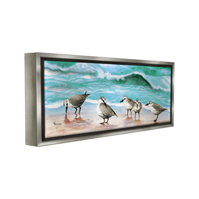 "Sandpipers le long de la plage" par Christine Reichow sur