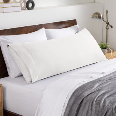 Fermeture de l'enveloppe du coussin en microfibre