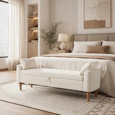 Banc de rangement rembourré en boucle avec accoudoirs et coussins cylindriques