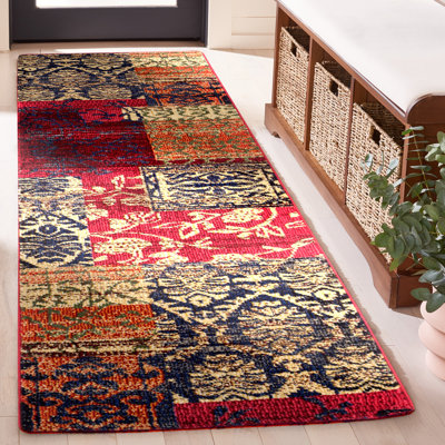 Tapis oriental rouge Hertzler