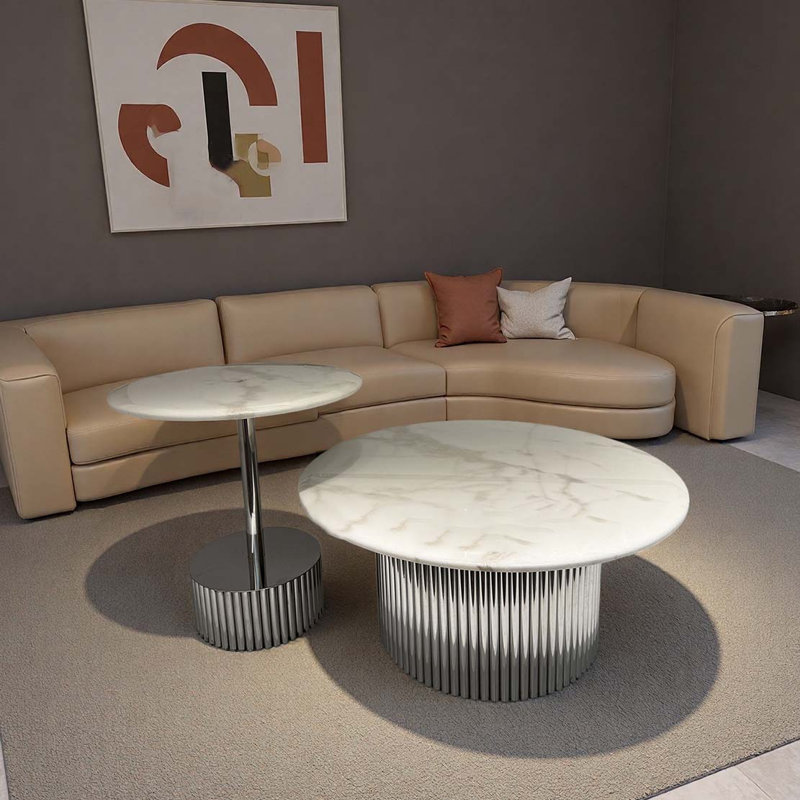 Table basse ronde en marbre avec base en métal argenté
