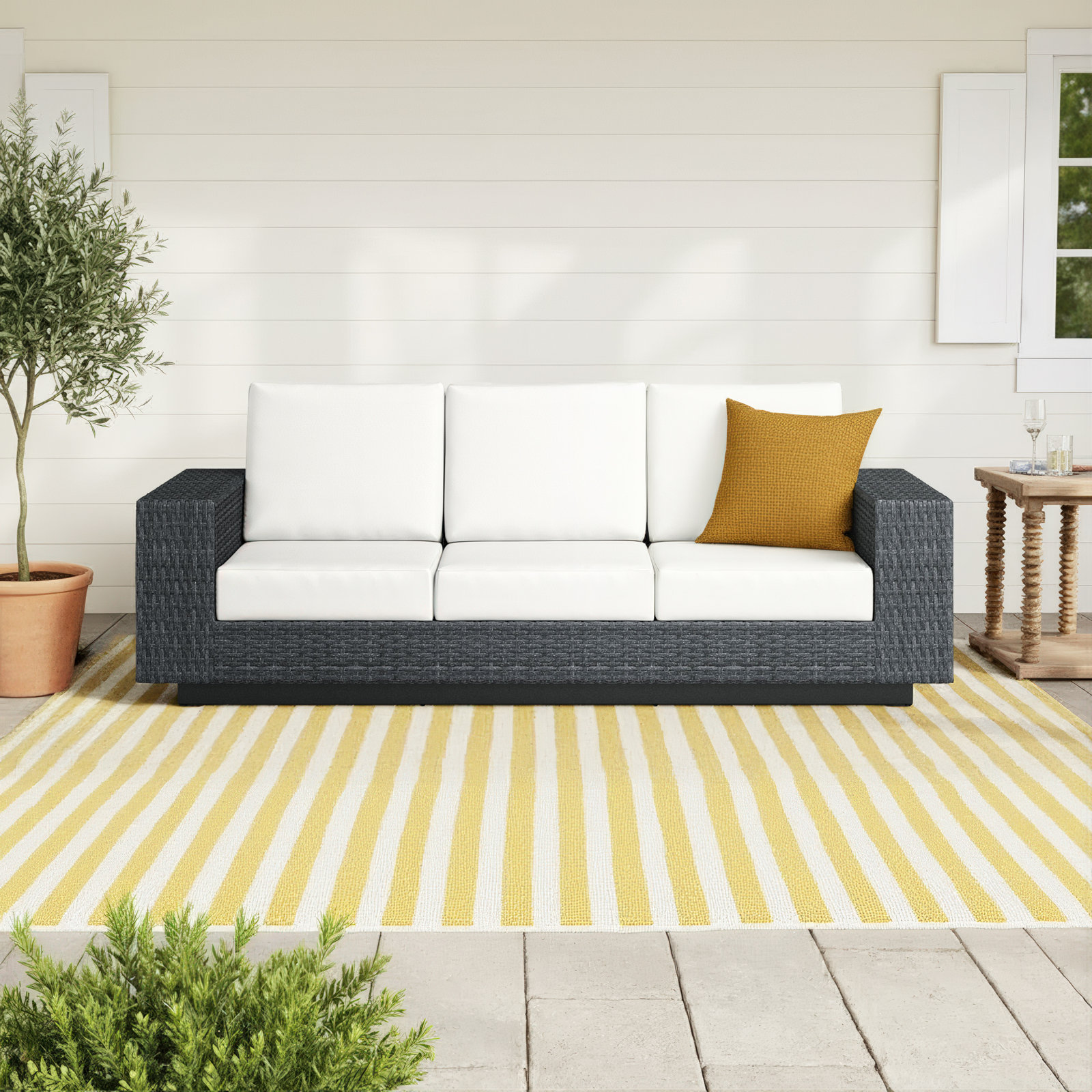 Jenette Wicker Outdoor Sofa with Sunbrella Cushions