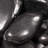 Rivora Nero Polished Quartzite Landscaping Pebbles, 0.75-1.25 in. (55 Bags, 40 lbs/Bag)
