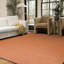 Tapis orange lavable à la machine Breneisha-1806220519