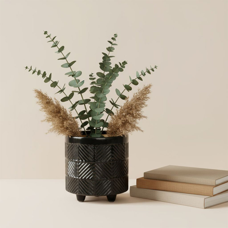 Boîte à fleurs noire en céramique texturée