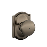 Plymouth Knob with Camelot Trim Bed and Bath Lock