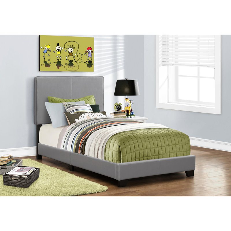 Lit simple en tissu d'ameublement gris avec une texture attrayante en similicuir
